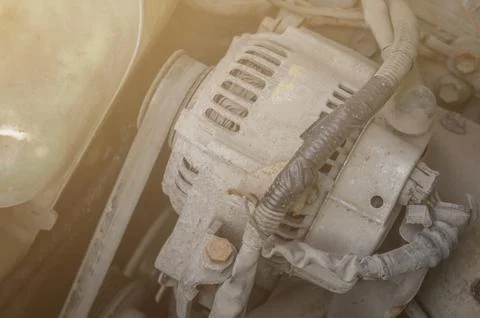 An old car engine generator. Engine repair and maintenance in an auto repair Stock Photos