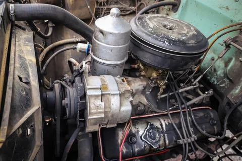 Old car generator close-up. Engine parts Stock Photos