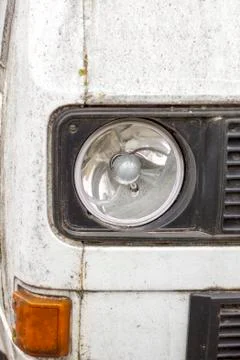 Old car, the headlight is broken, from the old age the color lost its freshne Stock Photos