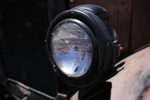 Old car headlight. Close up Stock Photos