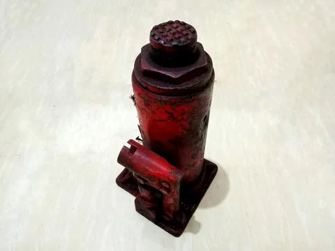 The old car jack is red Stock Photos