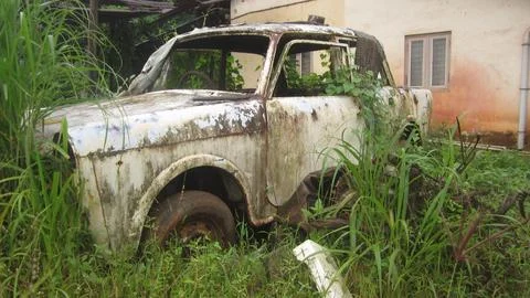 Old car, Old abandoned rusty vehicles, crushed cars in scrapyard, Stock Photos