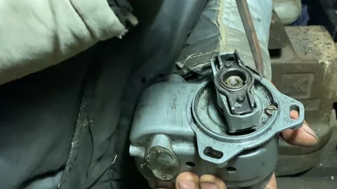Old car part in the hands of a mechanic close up Stock Footage 147301636