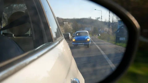 An old car in the rear-view mirror Stock Footage 105192089