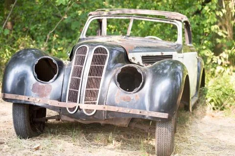Old Car rusting in forest 스톡 사진