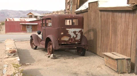 An old car sits in the ghost town of Garlock, California. Stock-Footage 27038760