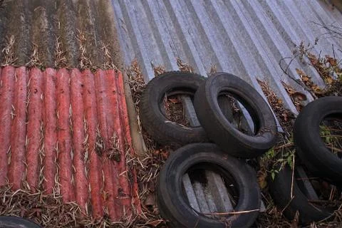 Old car tires on a different cipher Stock Photos
