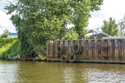 Old car tires on the dock Stock Photos