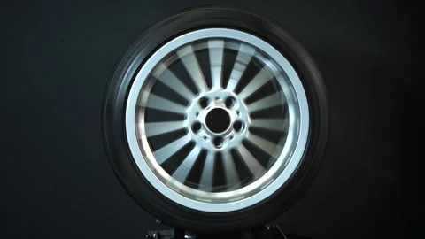 Old car wheels long exposure video spinning motion simulation Stock Footage 232266682