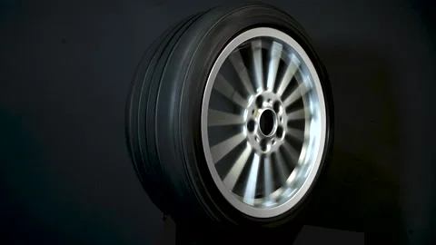 Old car wheels long exposure video spinning motion simulation Stock Footage 232266691