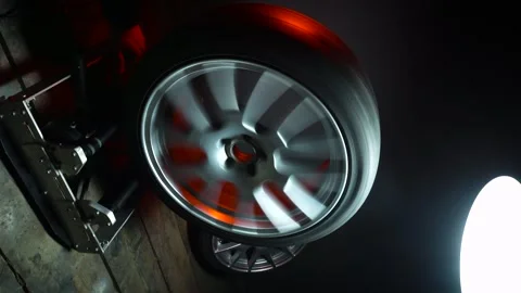 Old car wheels titanium rims long exposure video Stock Footage 305654438