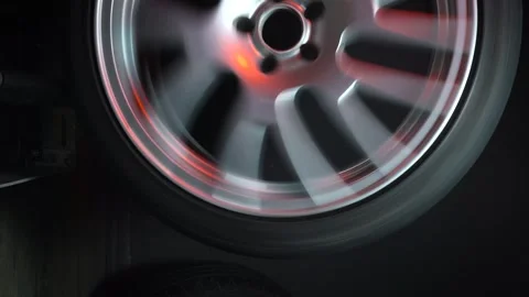 Old car wheels titanium rims long exposure video Stock Footage 305654566