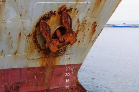 Old cargo ship with rusty anchor Stock Photos
