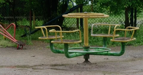 An old carousel on an abandoned playground Stock Footage 190962933
