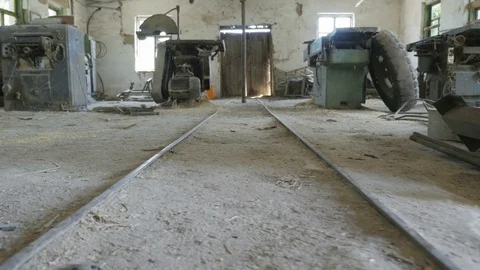 Old carpentry workshop with rails and dusty equipment Stock Footage 85297314
