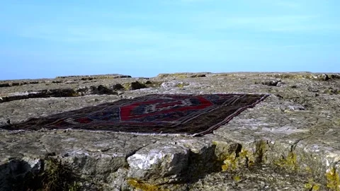Old carpet on the rock Stock Footage 167584587