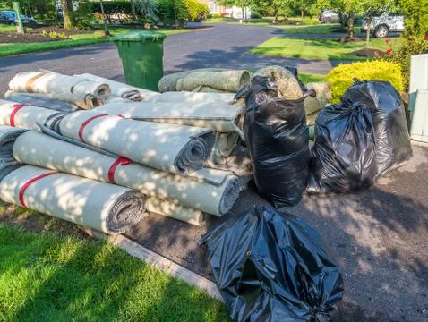 Old carpet rolls Stock Photos