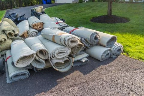 Old carpet rolls Stock Photos