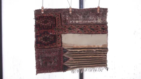 An old carpet on the window Stock Footage 86821308