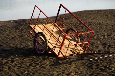 Old cart in beach Stock Photos