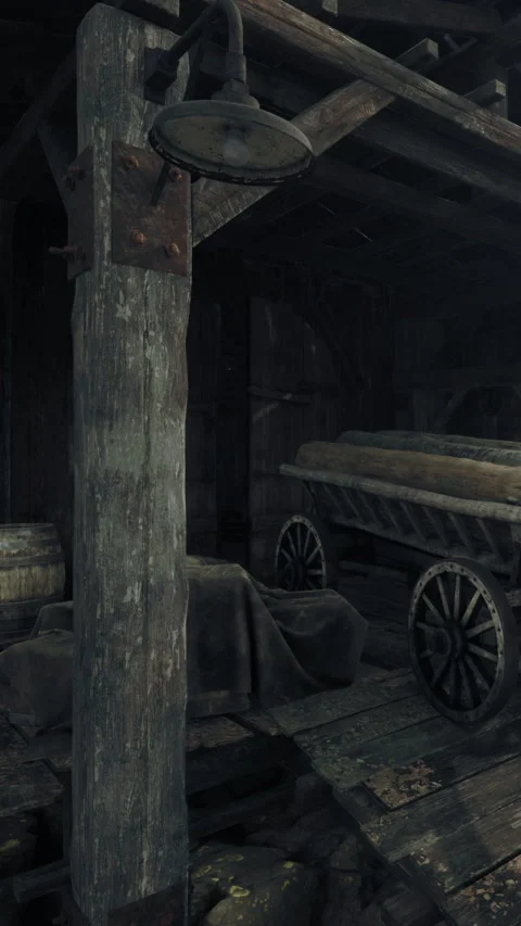 Old cart inside a dim wooden barn during the daytime Stock Footage 335688192