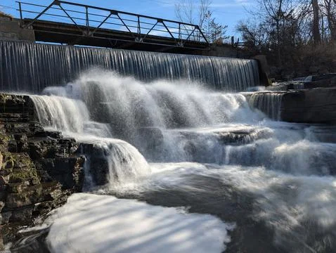 Old cascading Millpond 写真素材