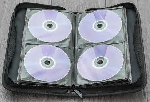 An old case with a collection of discs Stock Photos