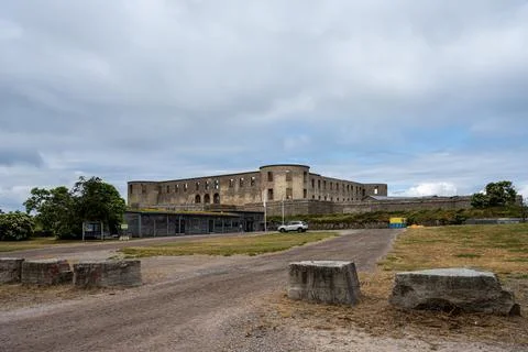 An old castle with a dramatic sky in the background Stock Photos
