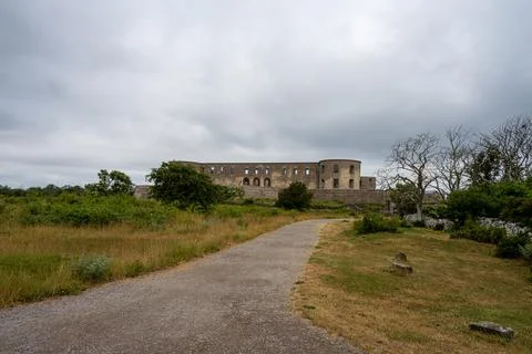 An old castle with a dramatic sky in the background Foto stock