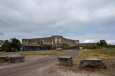 An old castle with a dramatic sky in the background Stock Photos