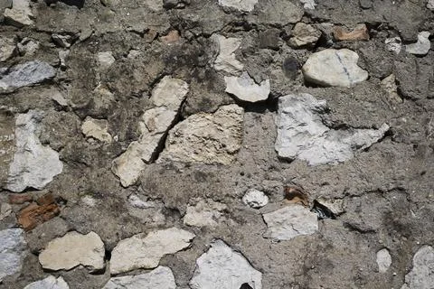 Old castle stone wall texture background. Stone wall as a background or textu Stock Photos