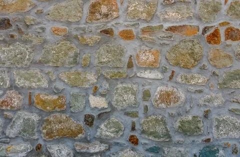 Old castle stone wall texture background. Stone wall as a background or tex.. Stock Photos