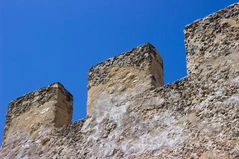 Old castle wall with tilts Stock Photos