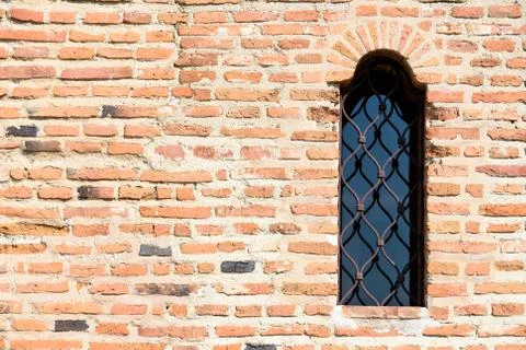 Old Castle Window On Brick Wall Stock Photos