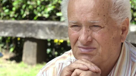 Old Caucasian Man Looking At Camera Stock Footage 64302962