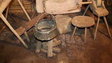 Old cauldron in ethno house Stock Footage 47748349