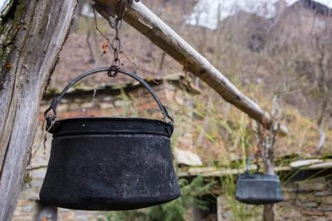 Old cauldron for water Stock Photos