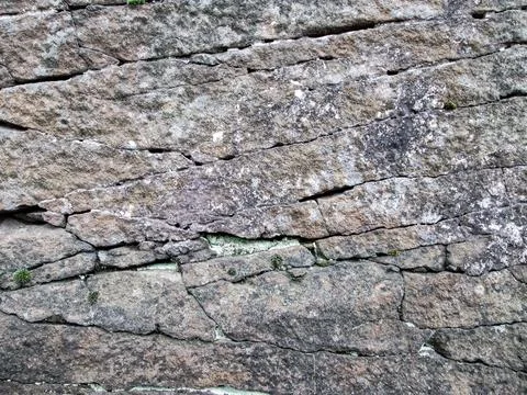 An old cave with layers and cracks. Sandstone deposit. The texture of the Stock Illustration