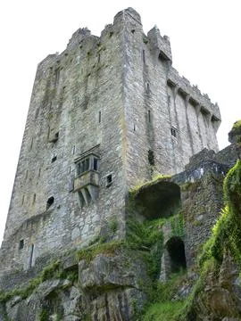 Old celtic castle tower isolated over white background, Blarney castle in I.. Stock Photos