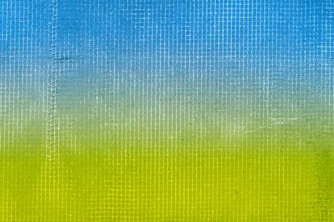 Old cement blue and green wall with net and stains, texture background Stock Photos