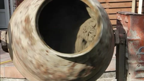 Old Cement Mixer Machine mixing concrete with sound Stock Footage 218956229