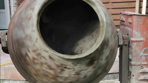 Old Cement Mixer Machine mixing concrete with sound Stock Footage 231057766