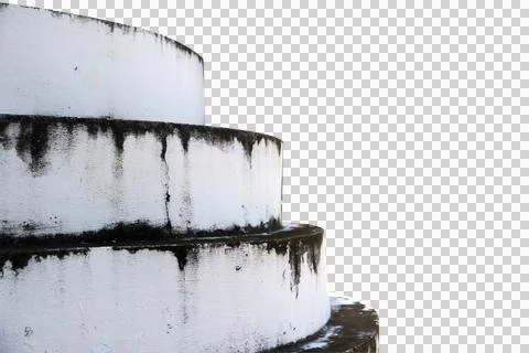 The old cement wall is broken, cracked, and damaged isolated on white backgro Stock Photos