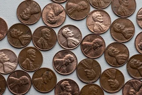 Old cent coins on white background. Stock Photos