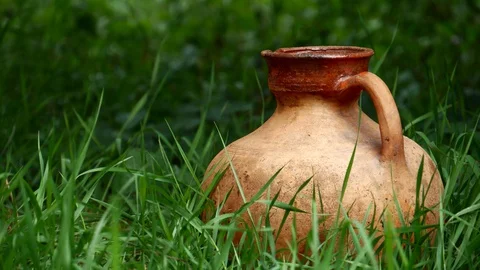 Old Ceramic Clay Jug In Grass (6) Stock Footage 127719373