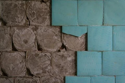 Old ceramic floor tiles falling off Stock Photos