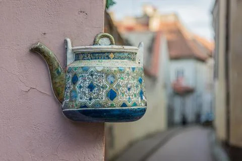 Old ceramic teapot embedded in a painted plastered wall Stock Photos