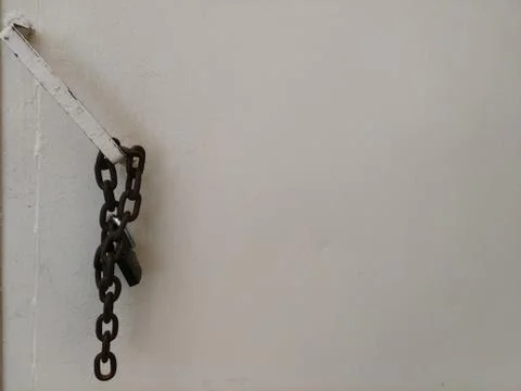 An Old Chain Lock On The Door For Security Stock-Fotos