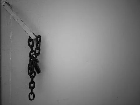 An Old Chain Lock On The Door For Security 写真素材