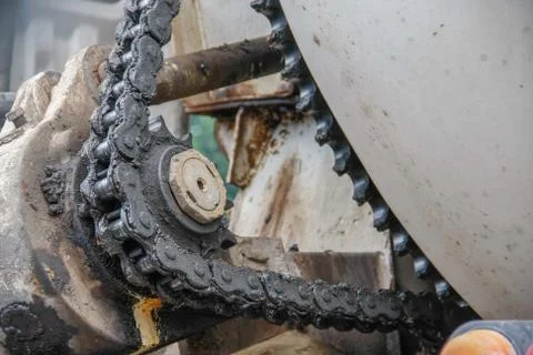 Old chain with propel roller Stock Photos
